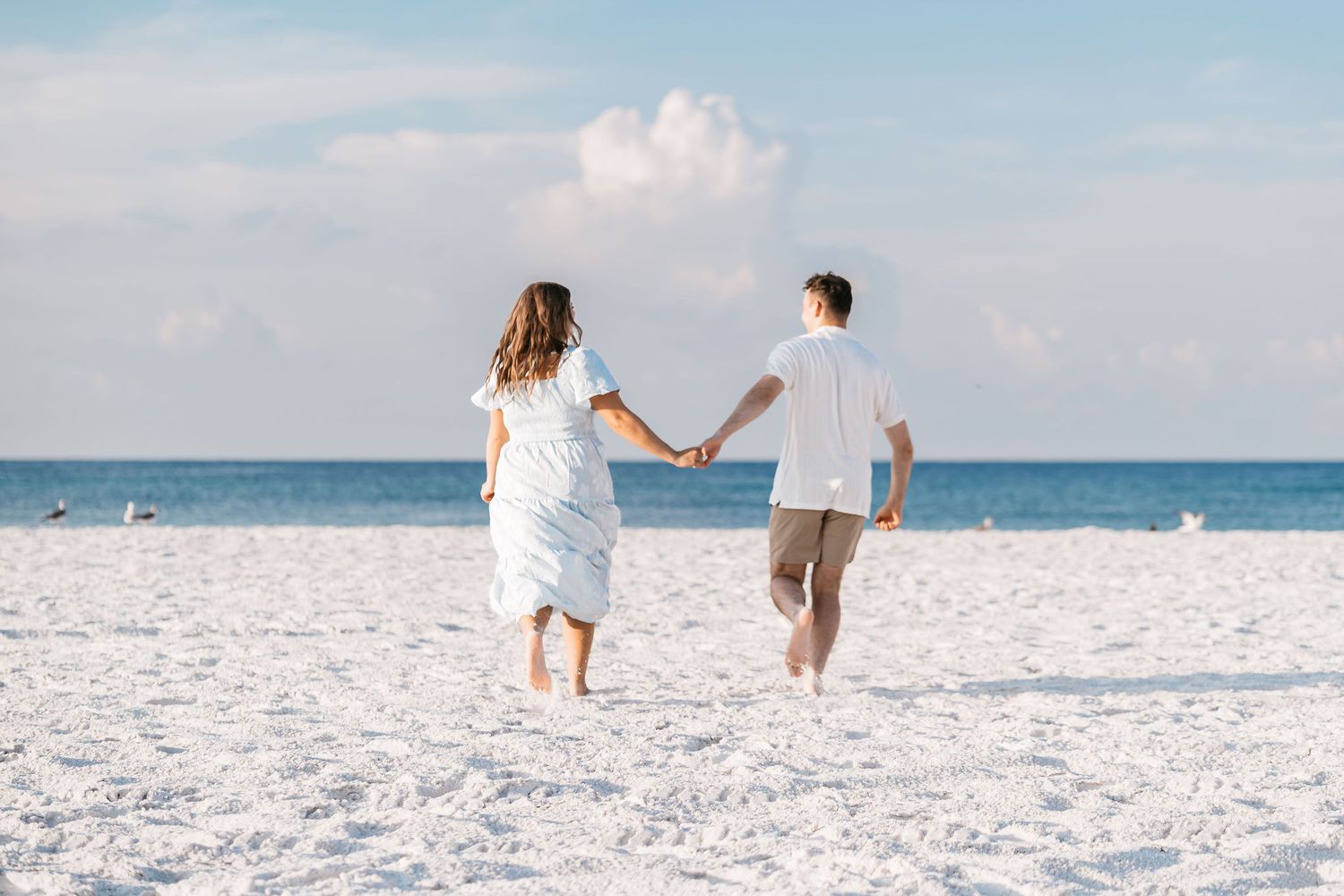 local favorite beach to spend the day at. kid friendly quiet beautiful white sandy beach for sunrise photos. free parking and close to bars.