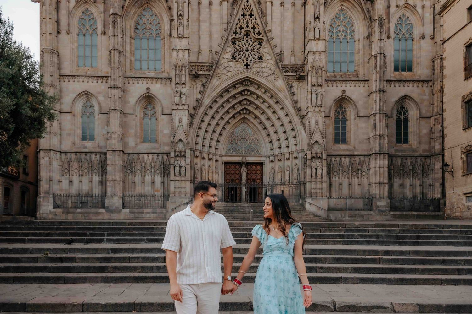 Romantic couple walking in Barcelona streets