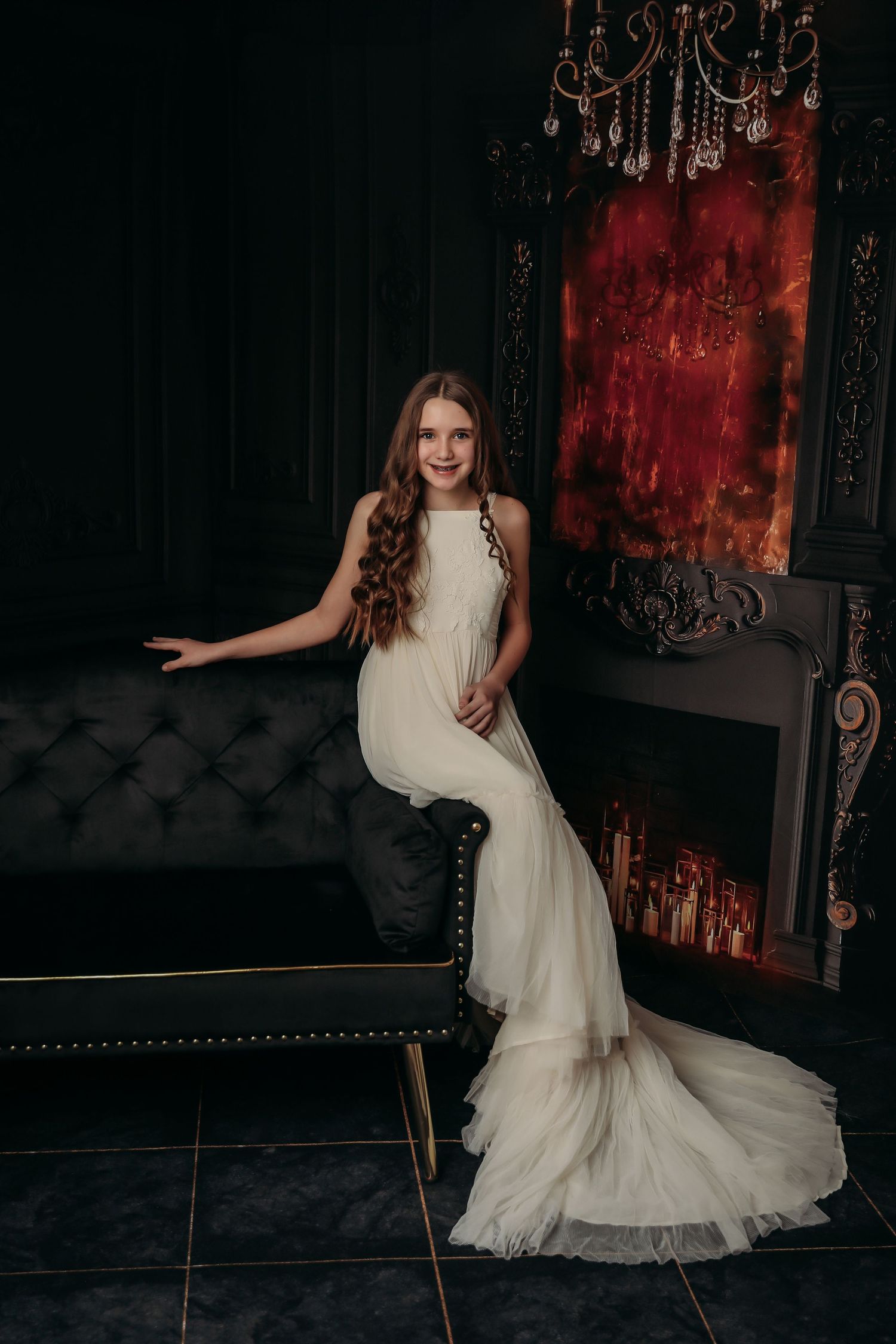 A series of elegant bridal portraits showing a white gown against a dark moody backdrop with vintage furniture.