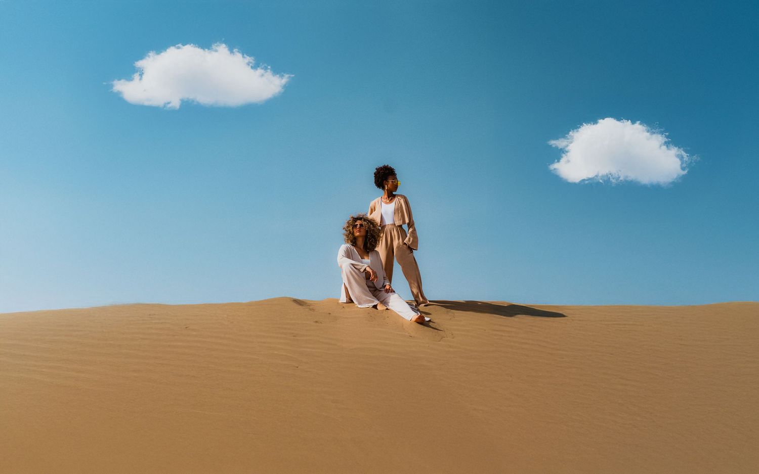 Fashion photography in Dubai desert dunes