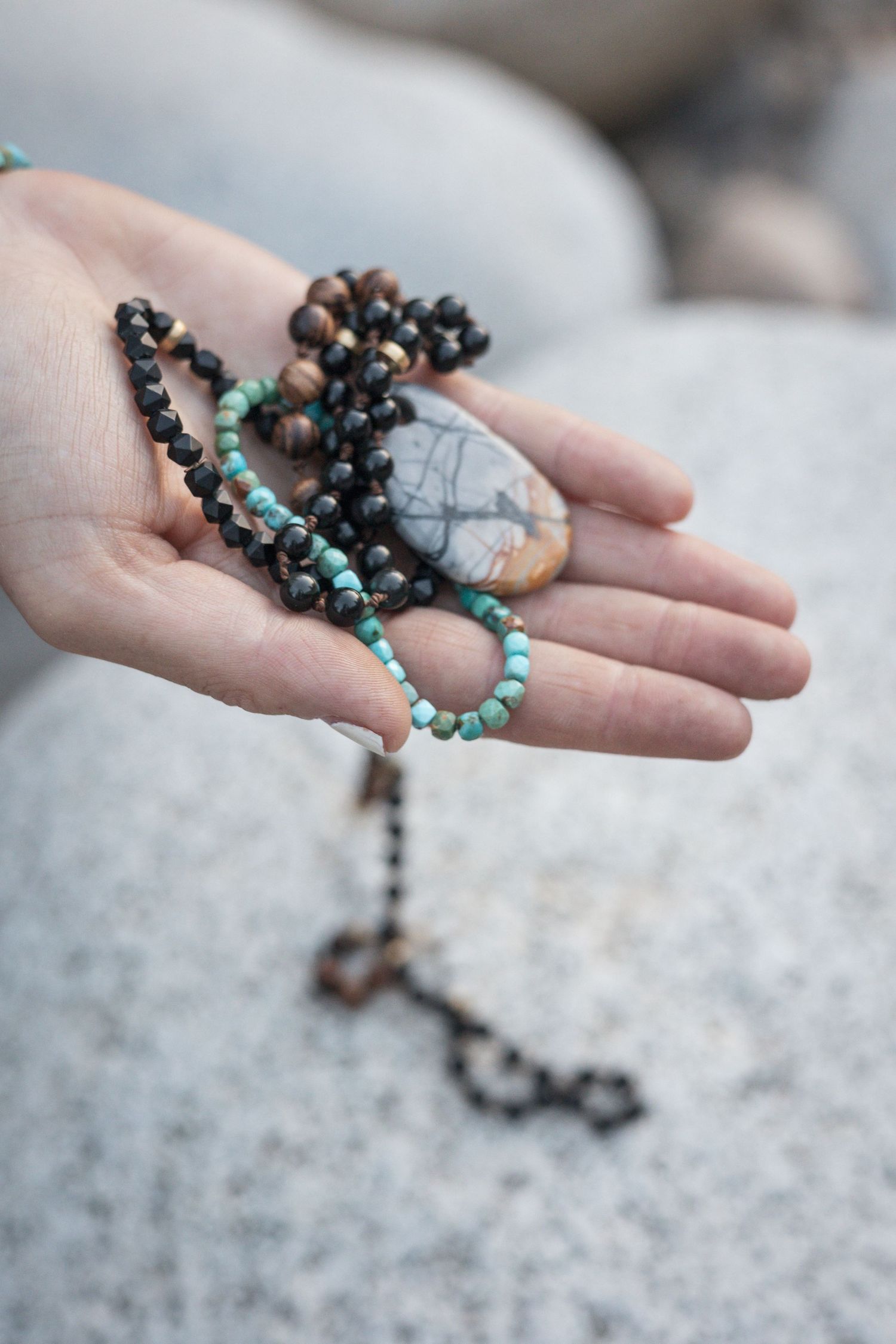 Product photography for small business making mala jewelry.