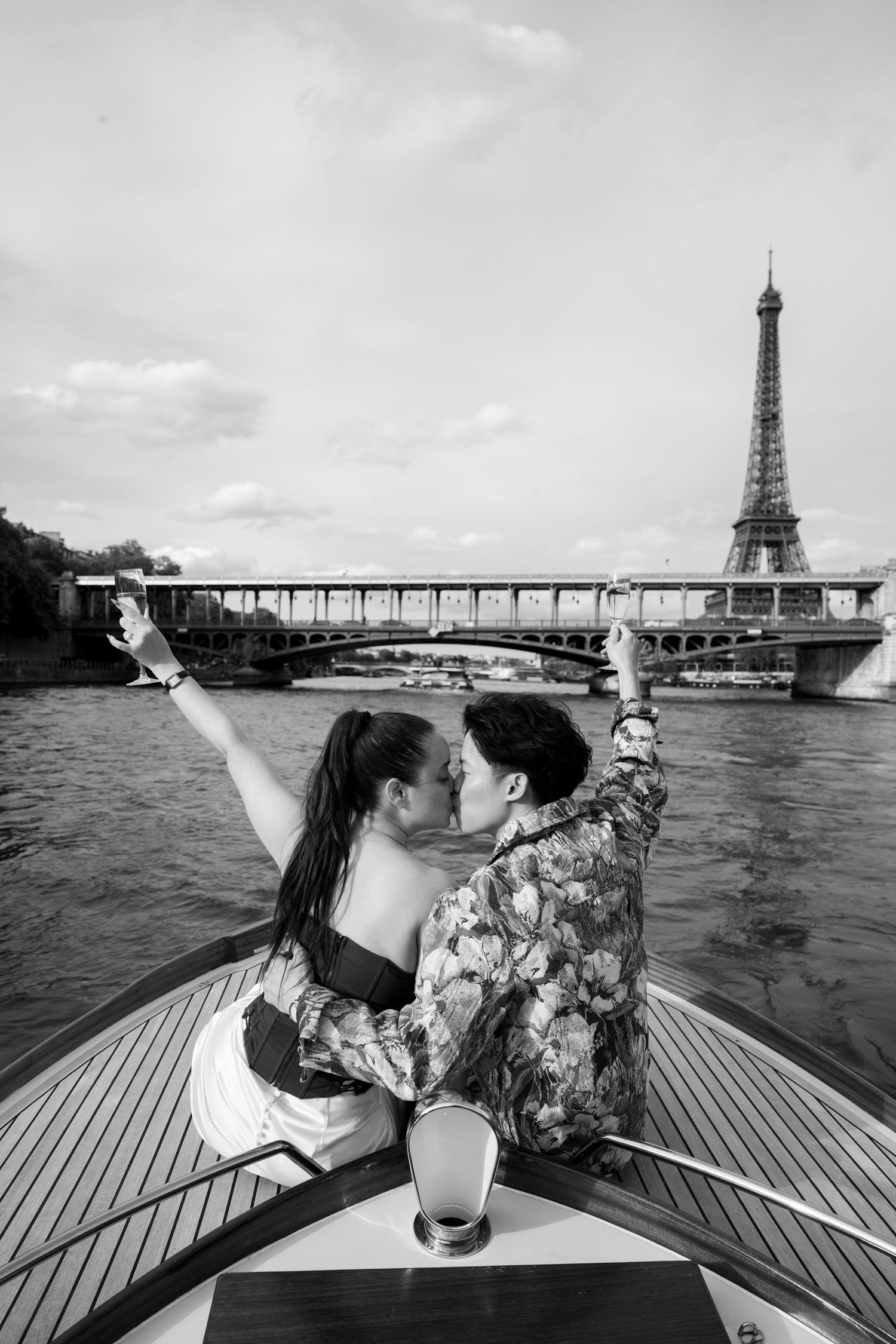 A romantic proposal moment overlooking a coastal mountain landscape with misty views of the Mediterranean Sea below.