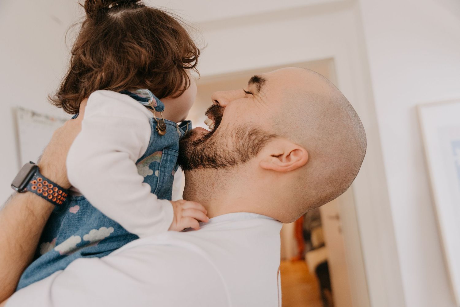 Parent and child share tender moments together in a series of loving interactions.
