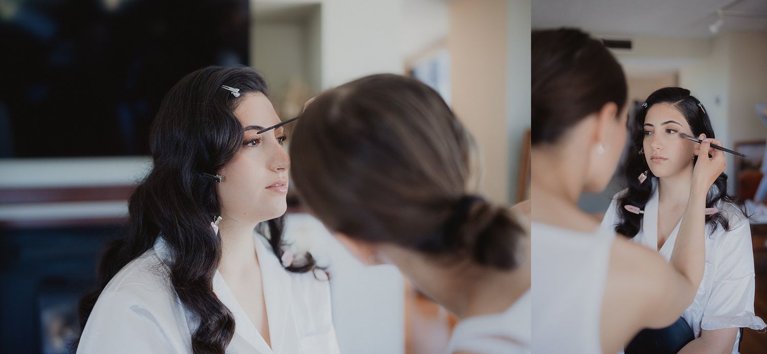 Getting ready in a bright room with makeup being applied during wedding preparations.