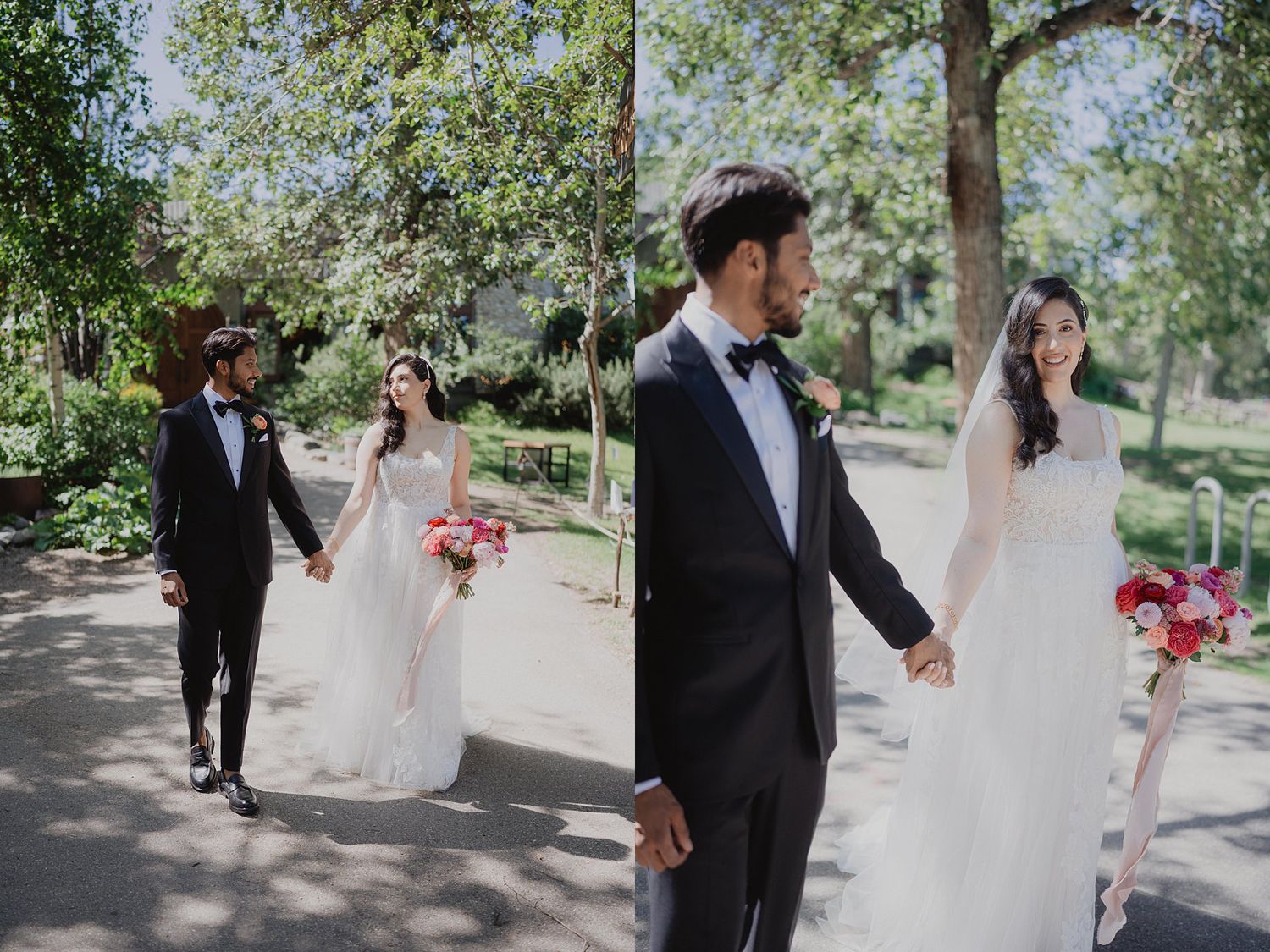 A couple walks together on a tree-lined path during their wedding celebration.