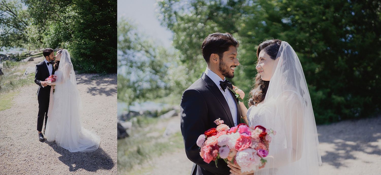 A romantic outdoor wedding photoshoot in a lush green garden setting with natural sunlight filtering through trees.