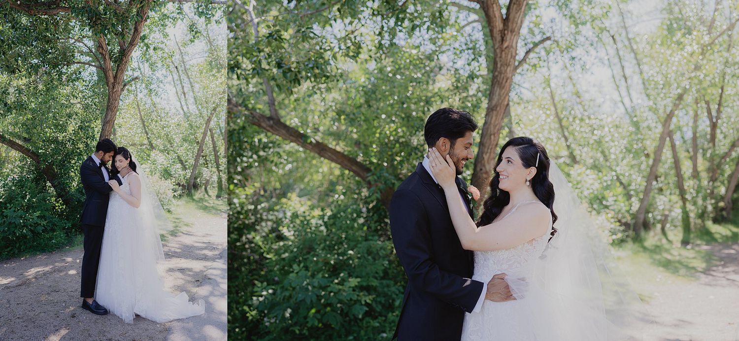 Wedding party walking through a serene wooded area with sunlight filtering through the trees.
