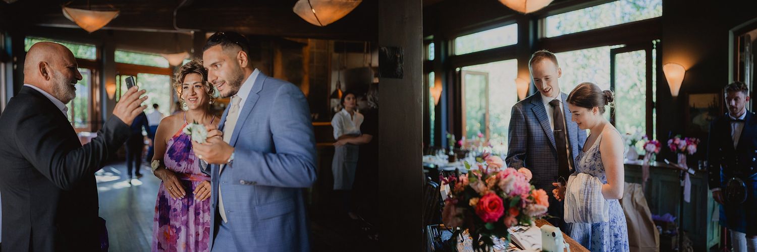Wedding guests mingle and celebrate at an outdoor reception with string lights overhead.
