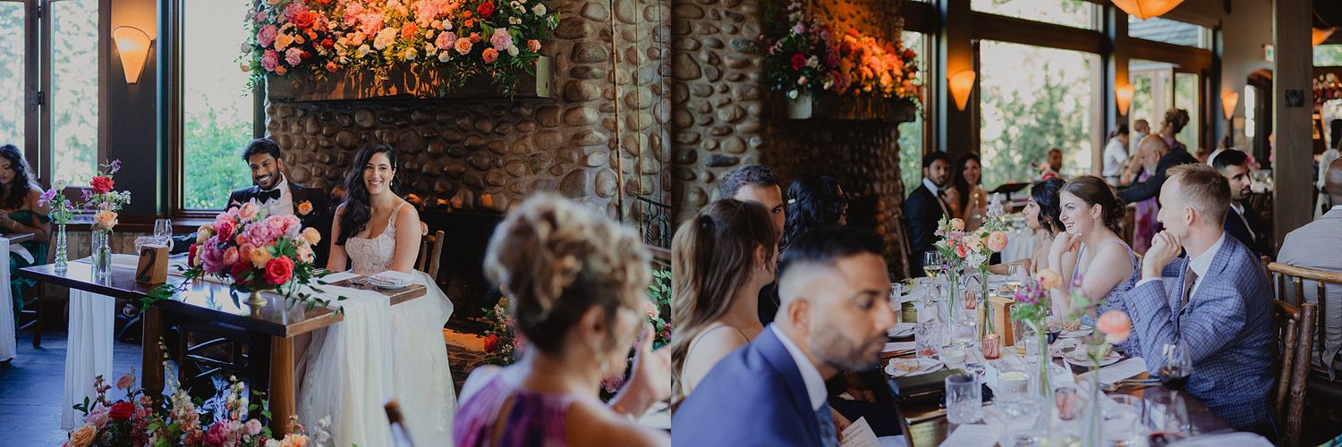 Wedding reception venue with warm lighting and stone walls filled with celebrating guests.