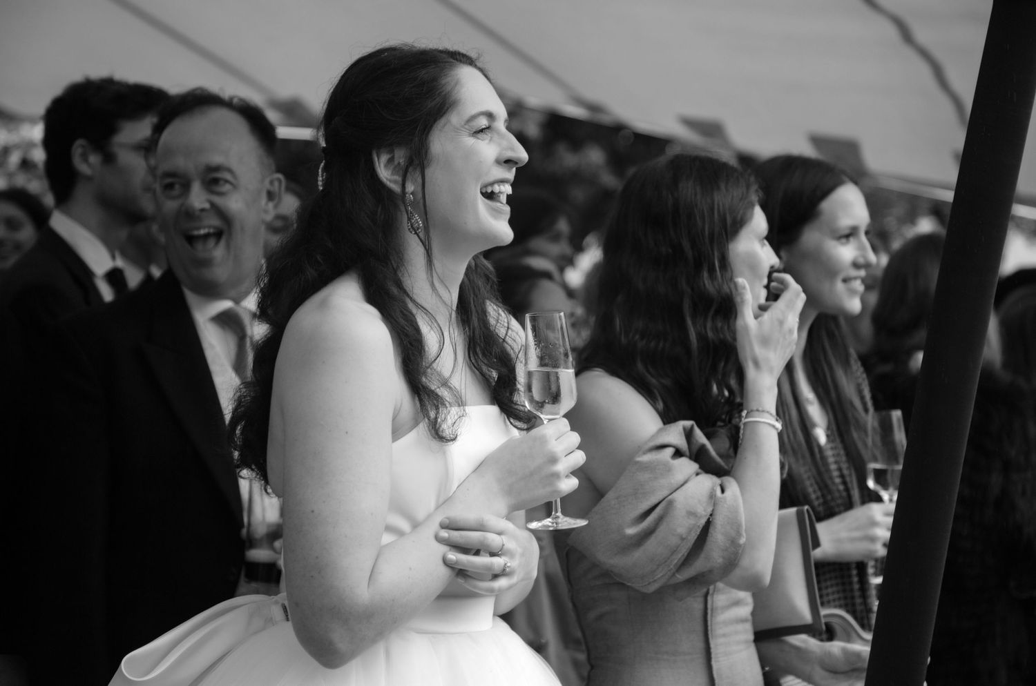 wedding speeches emotions bride laughing black and white photography