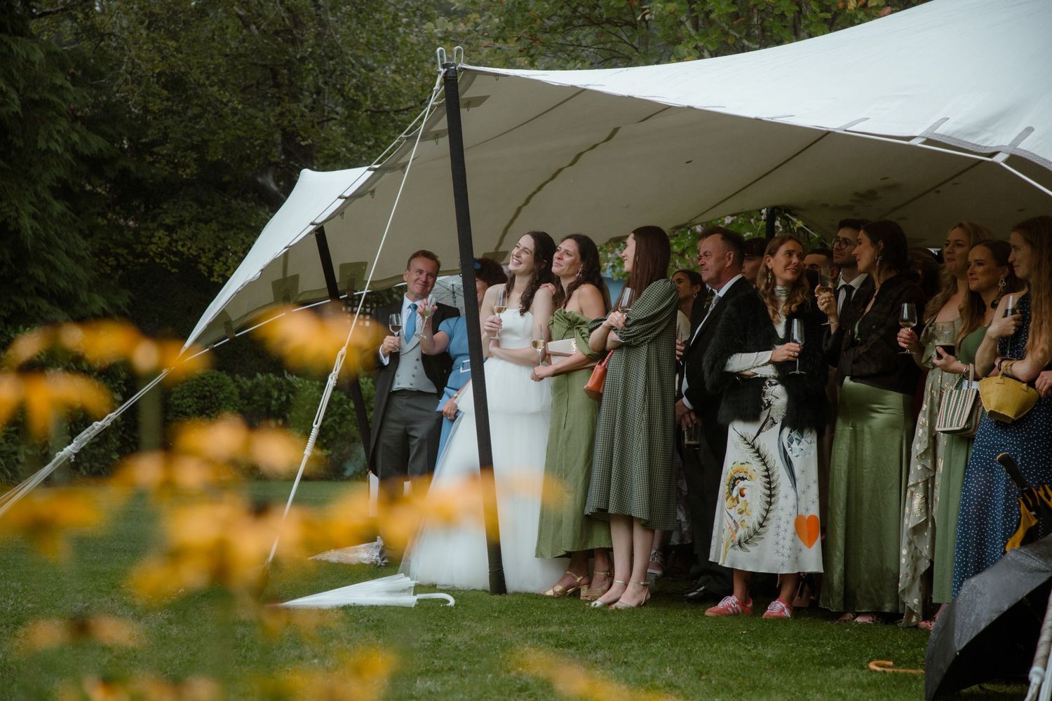 wedding reception bride and groom wedding marque flowers photograph candid photography