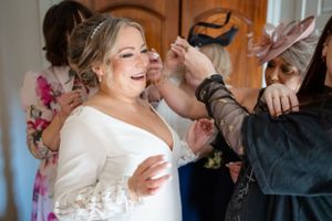 Bride getting makeup done at banchory lodge hotel