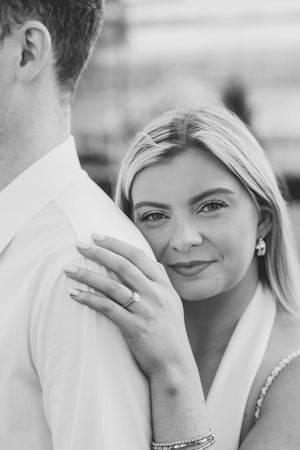Black and white close-up portraits showing tender romantic moments.