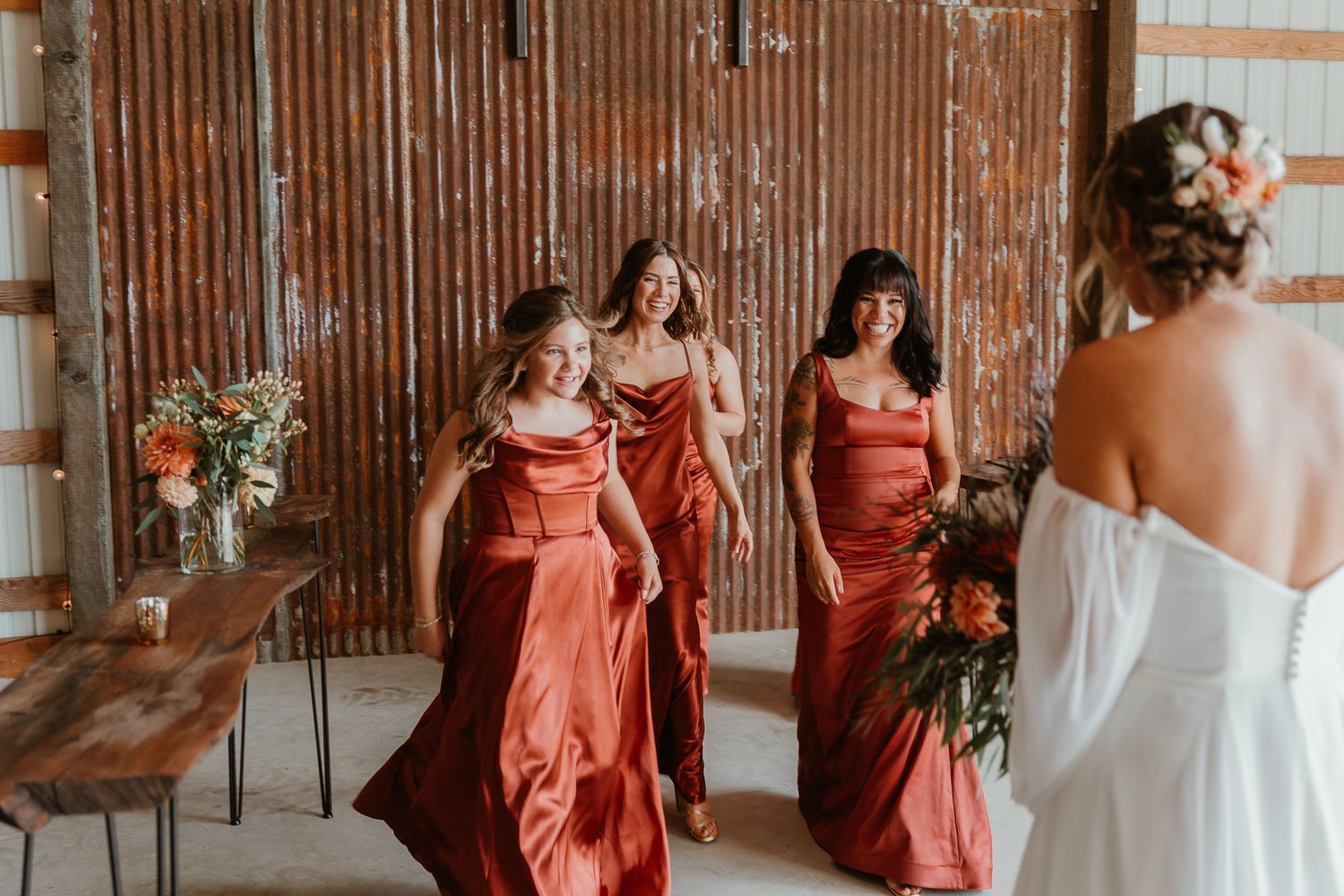 Running to embrace the bride after their first look.