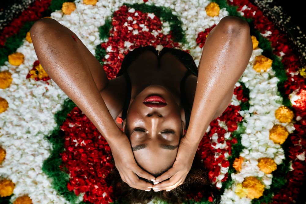 Artistic overhead shot featuring a decorative arrangement of colorful flower petals.