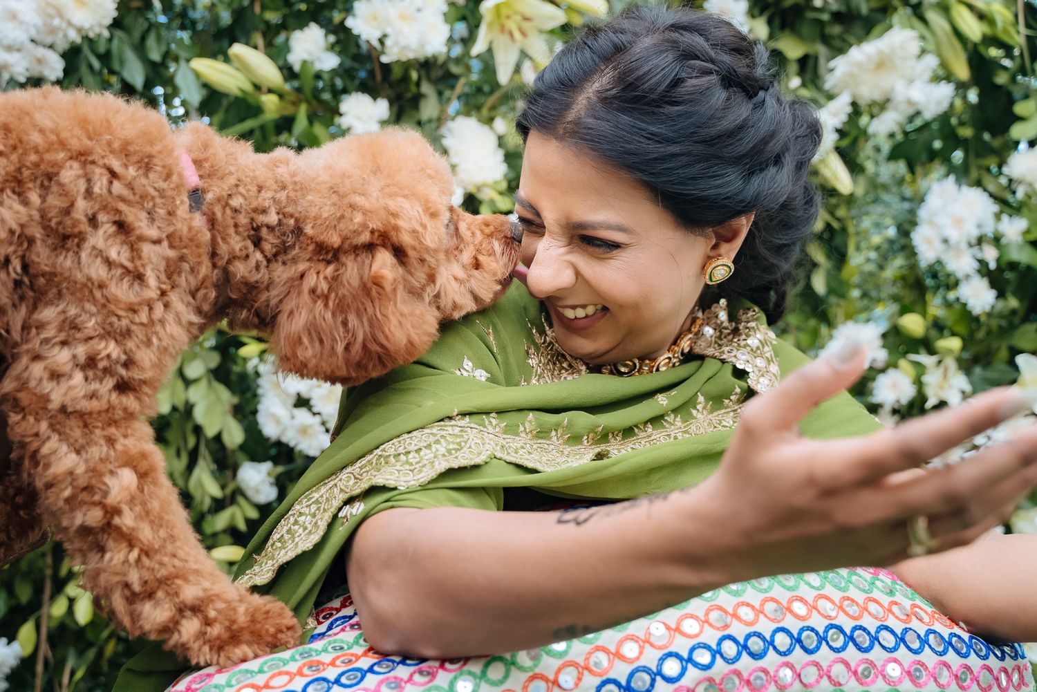 Bride Itisha enjoying her Mehendi surrounded by family and friends