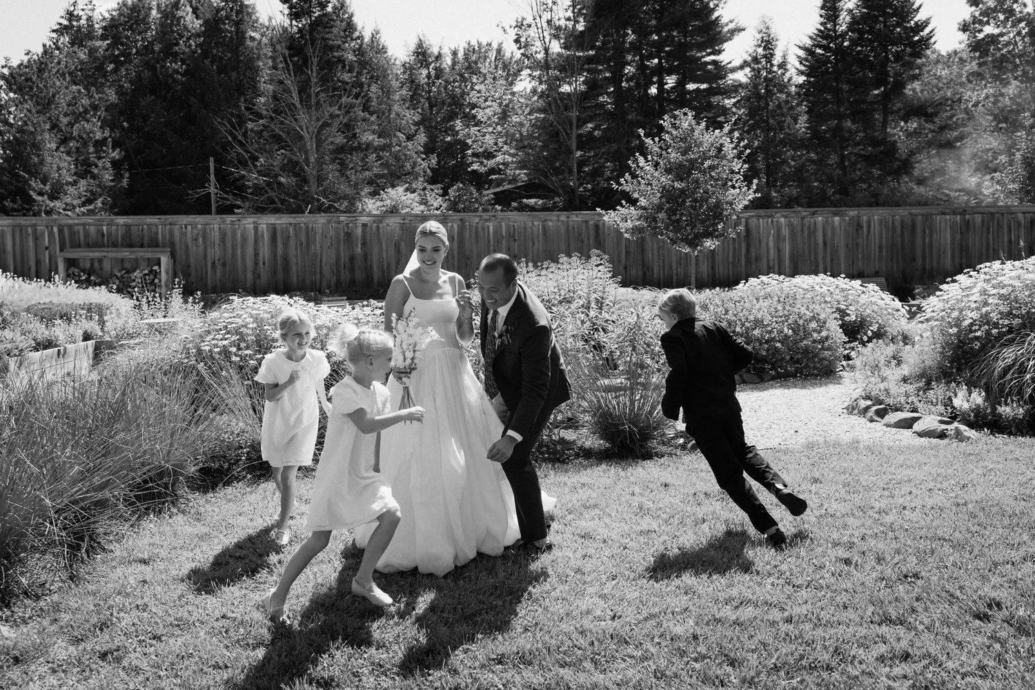 Black and white photos capture moments from a Korean-Western fusion wedding celebration.