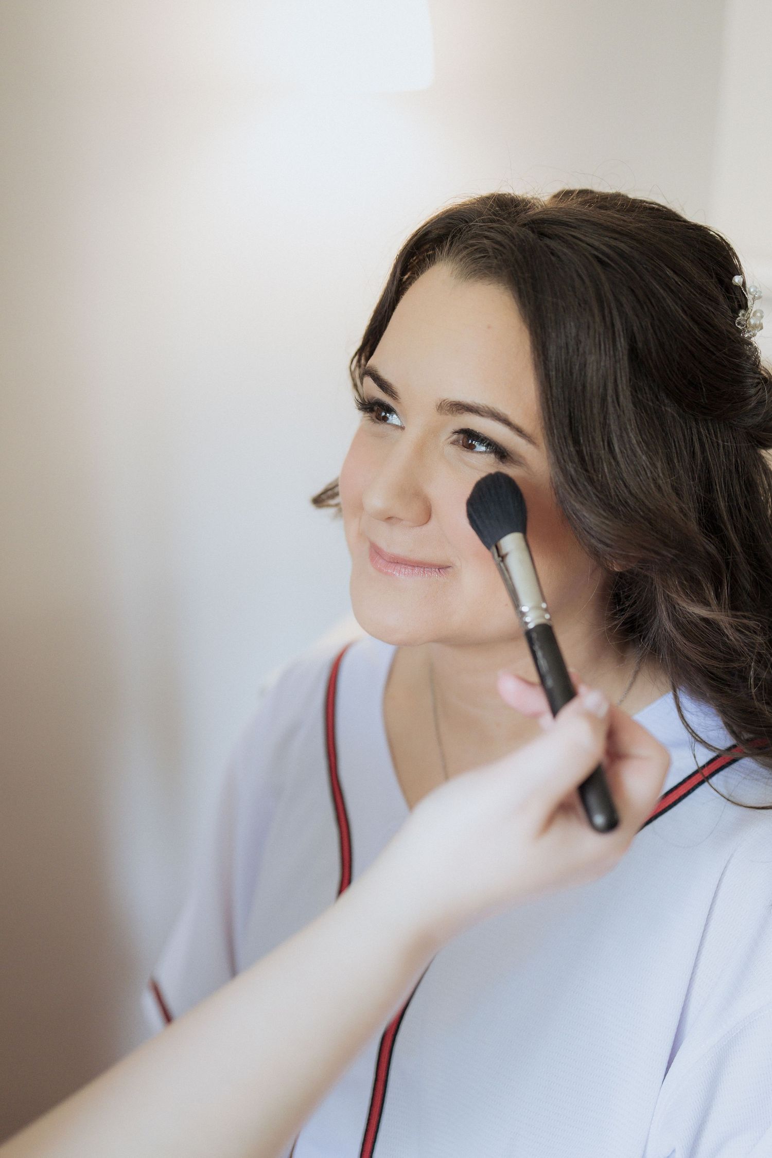bride gets her makeup done at Grand Ivory, Moncton wedding photography packages New Brunswick two photographers high-end wedding packages