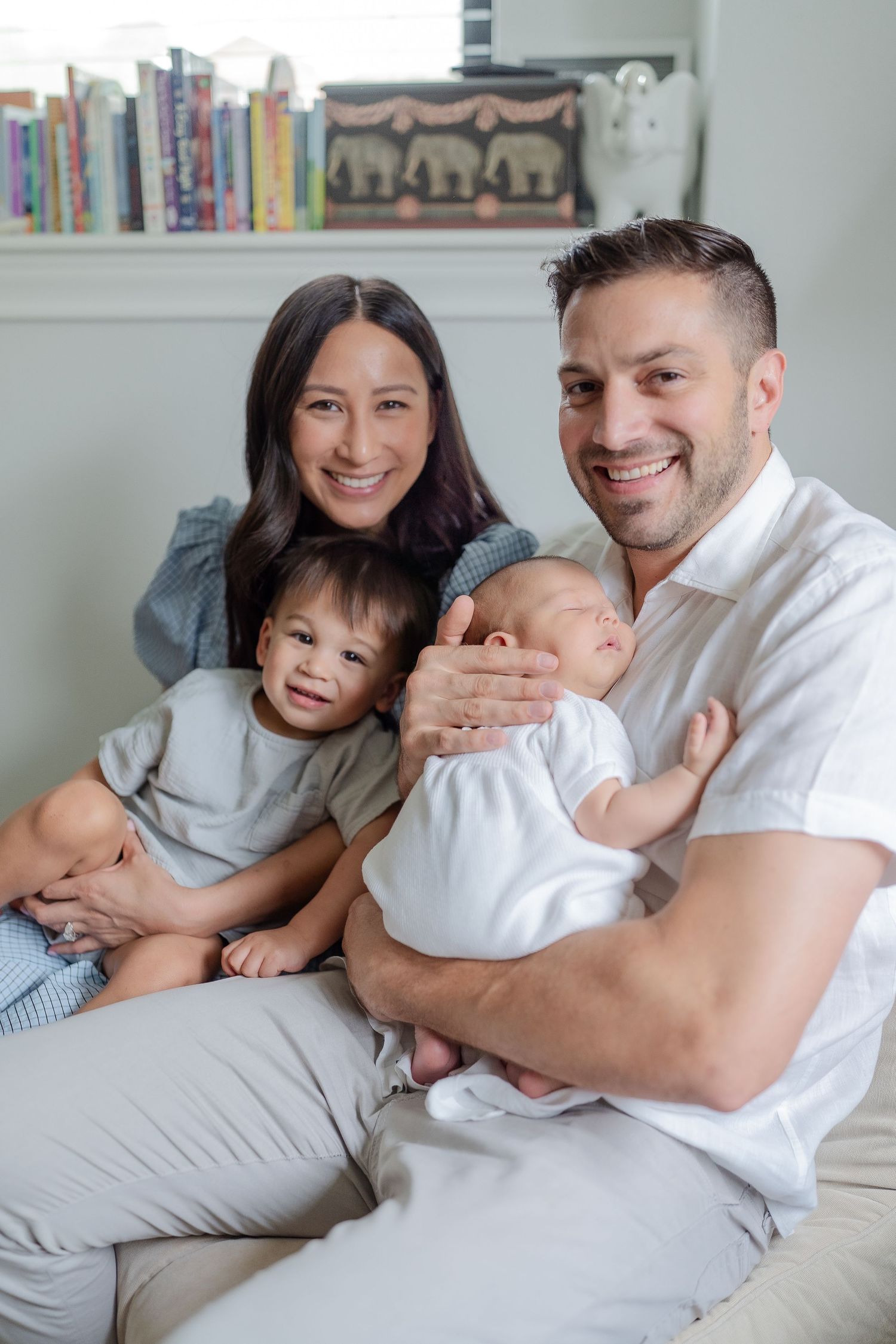 newborn family session, family smiling