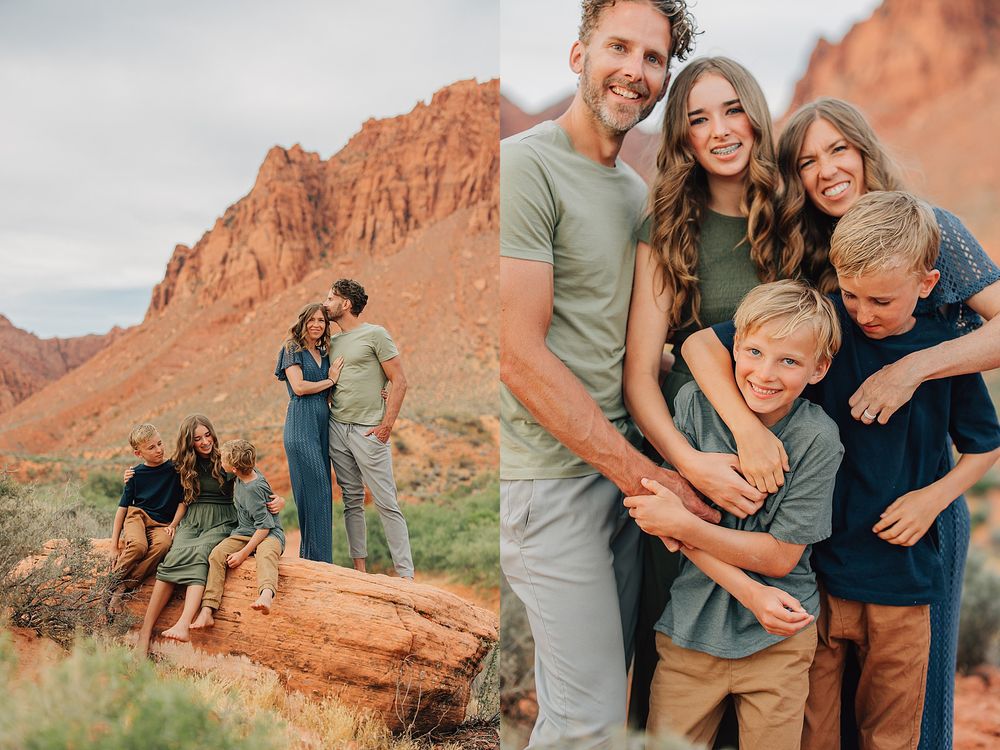 Family posing among red rock formations in a desert landscape, smiling and embracing outdoors.