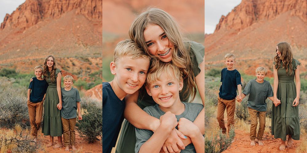A girl hugging a boy in a desert landscape with red rock formations in the background.