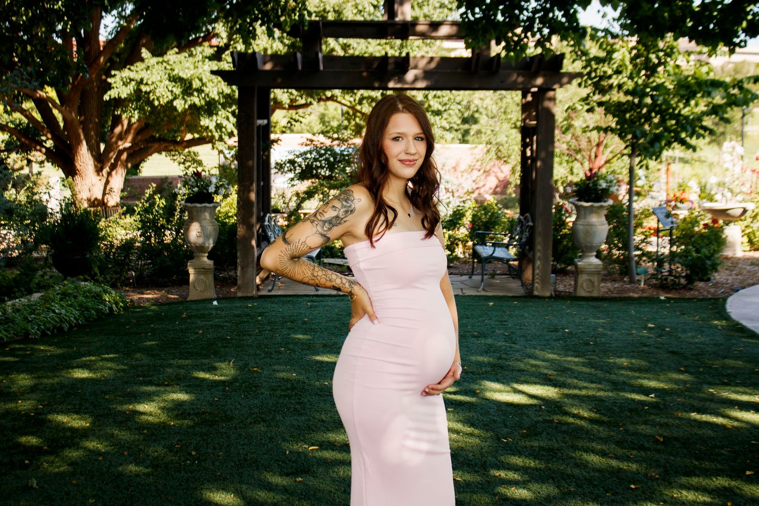 An expecting mother during a maternity photo session at The Botanical Gardens in Amarillo, Texas