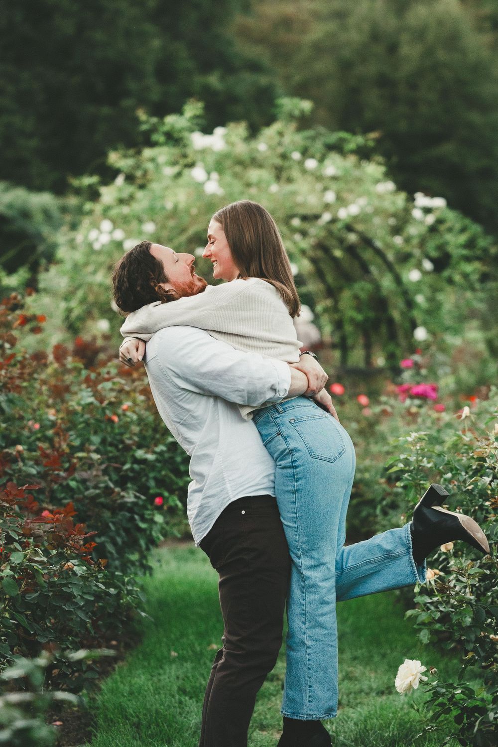 Romantic engagement photos at Bon Air Rose Garden