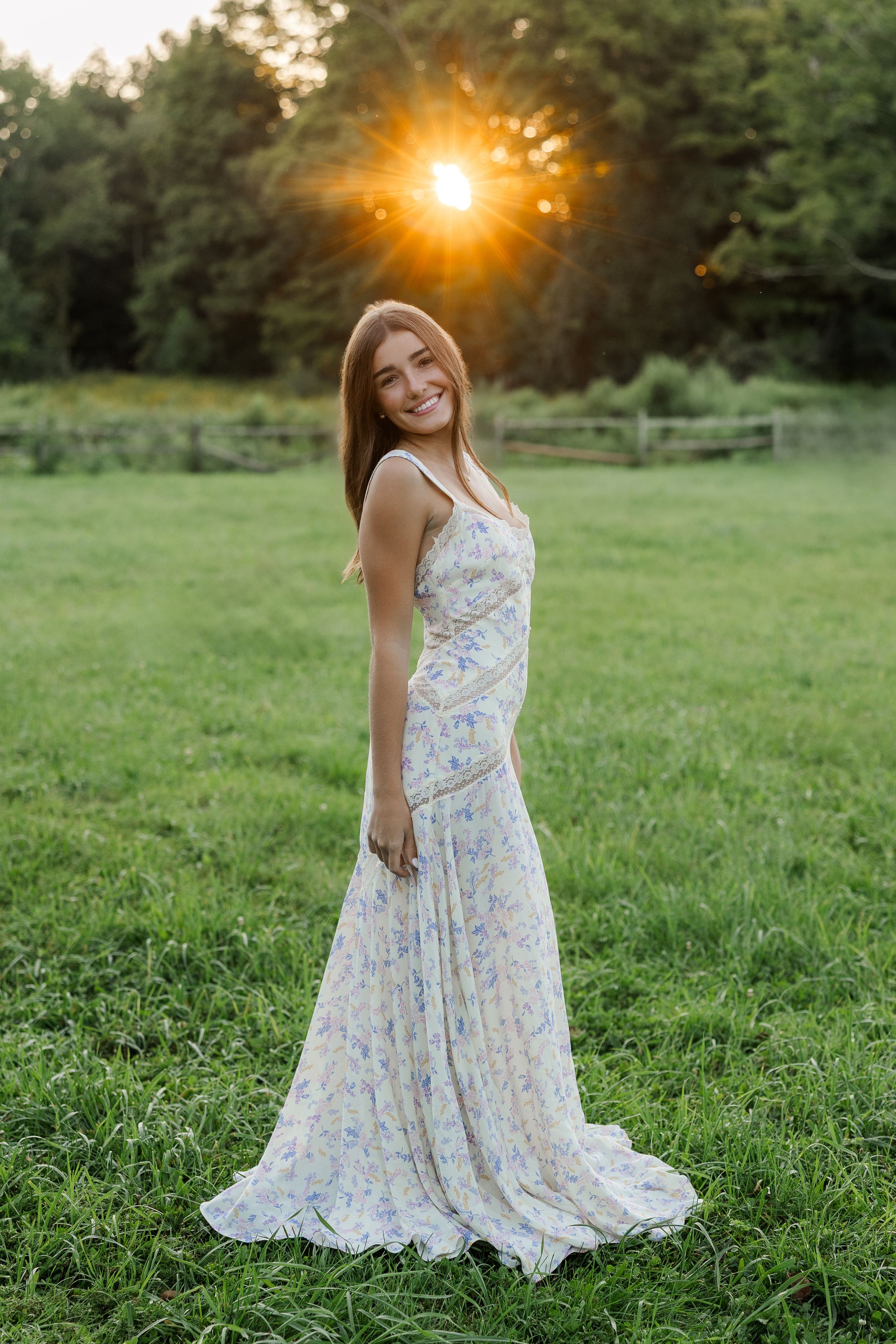 Stunning outdoor senior portraits in Ridgefield, CT. Capture natural light and local scenery for your milestone. Book your session today!