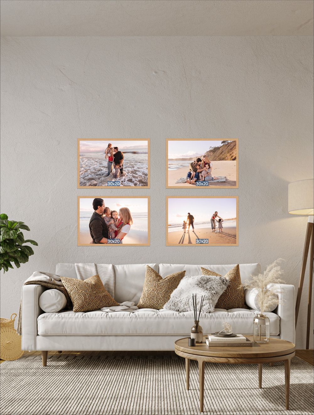 Four large rose gold-framed beach family photos arranged in a square grid above a white sofa in a cozy living room.