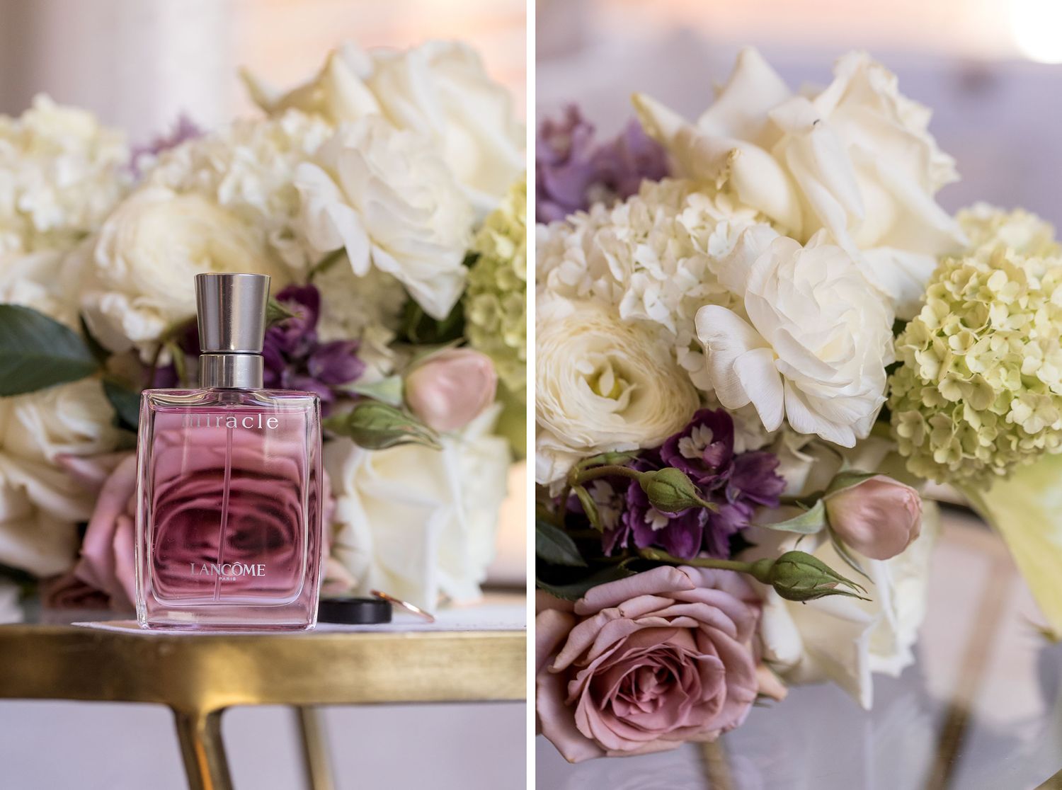 Pink perfume bottle surrounded by elegant white roses, purple flowers and hydrangeas on a gold surface.