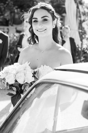 Series of wedding portraits showing a bride with roses next to a white car.