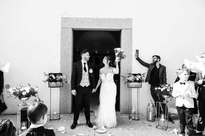 Wedding reception candid moments captured in black and white photography.