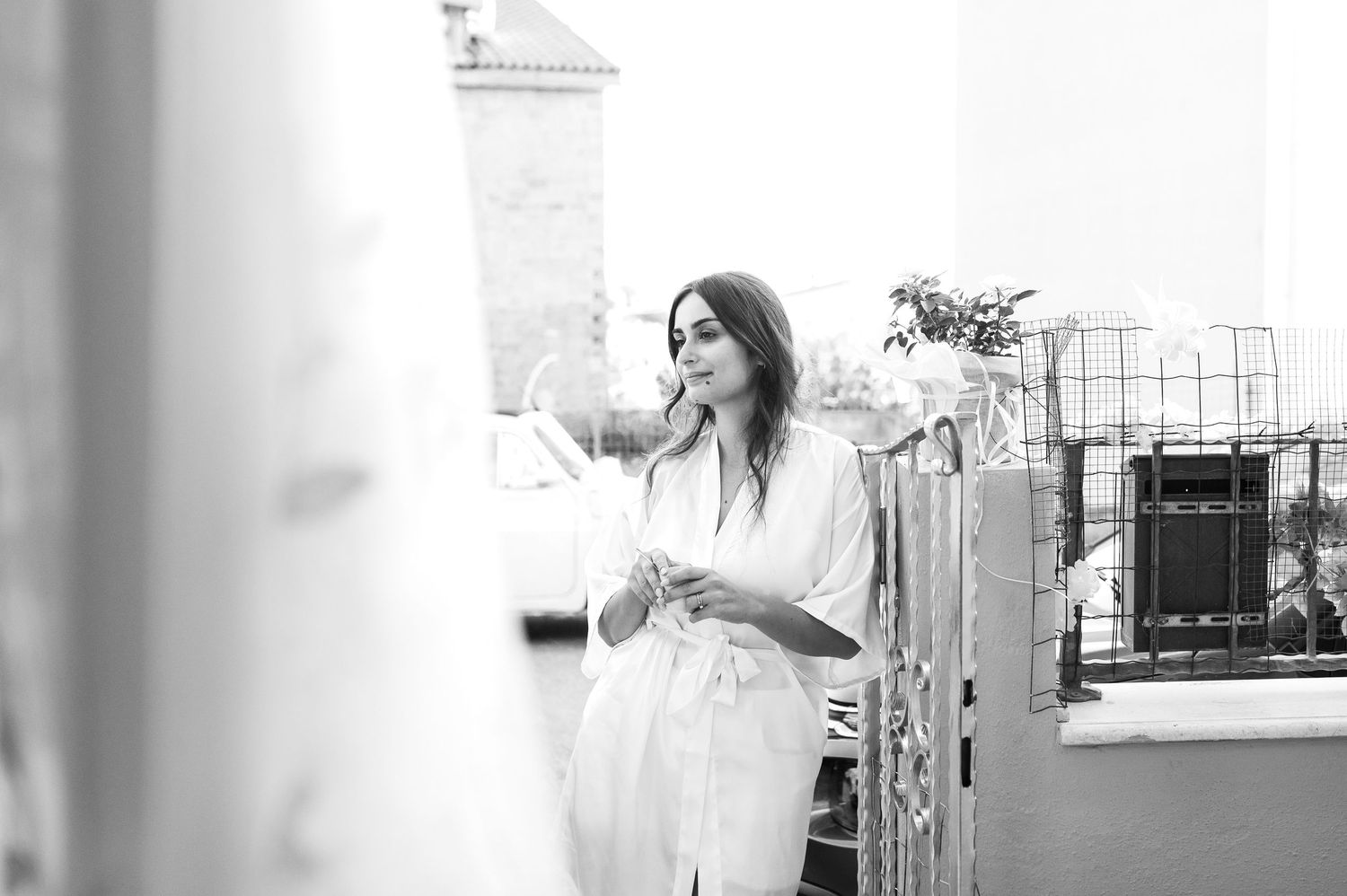 Black and white getting ready moments captured through reflections and natural light.