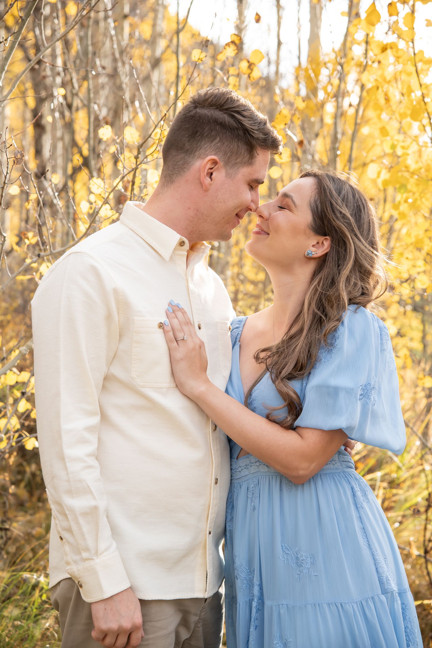 Vail Engagement Photos with a cute couple in the golden aspen leaves of fall