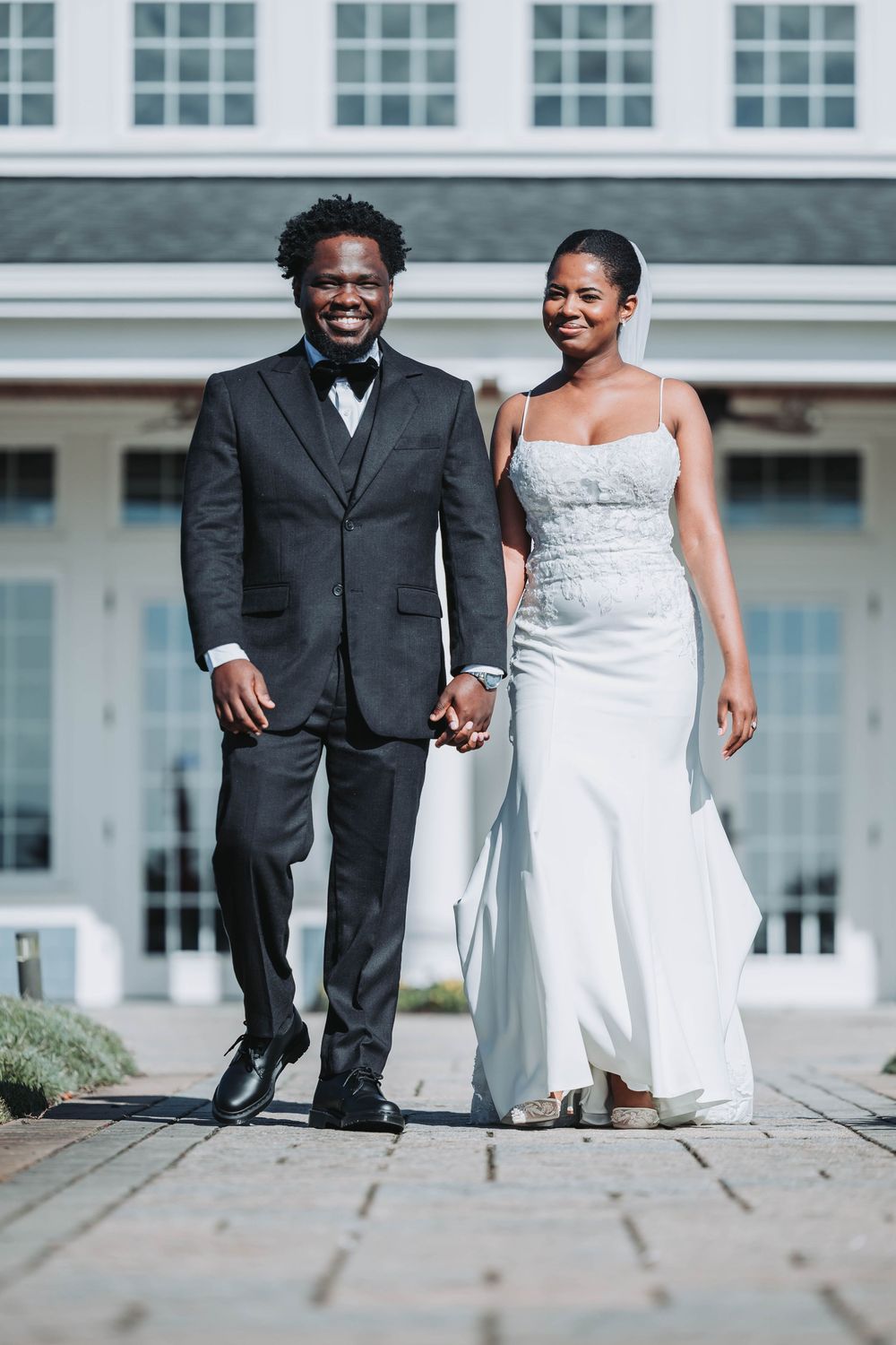 A happy couple in wedding attire stands together outdoors in a series of candid shots on a sunny day.