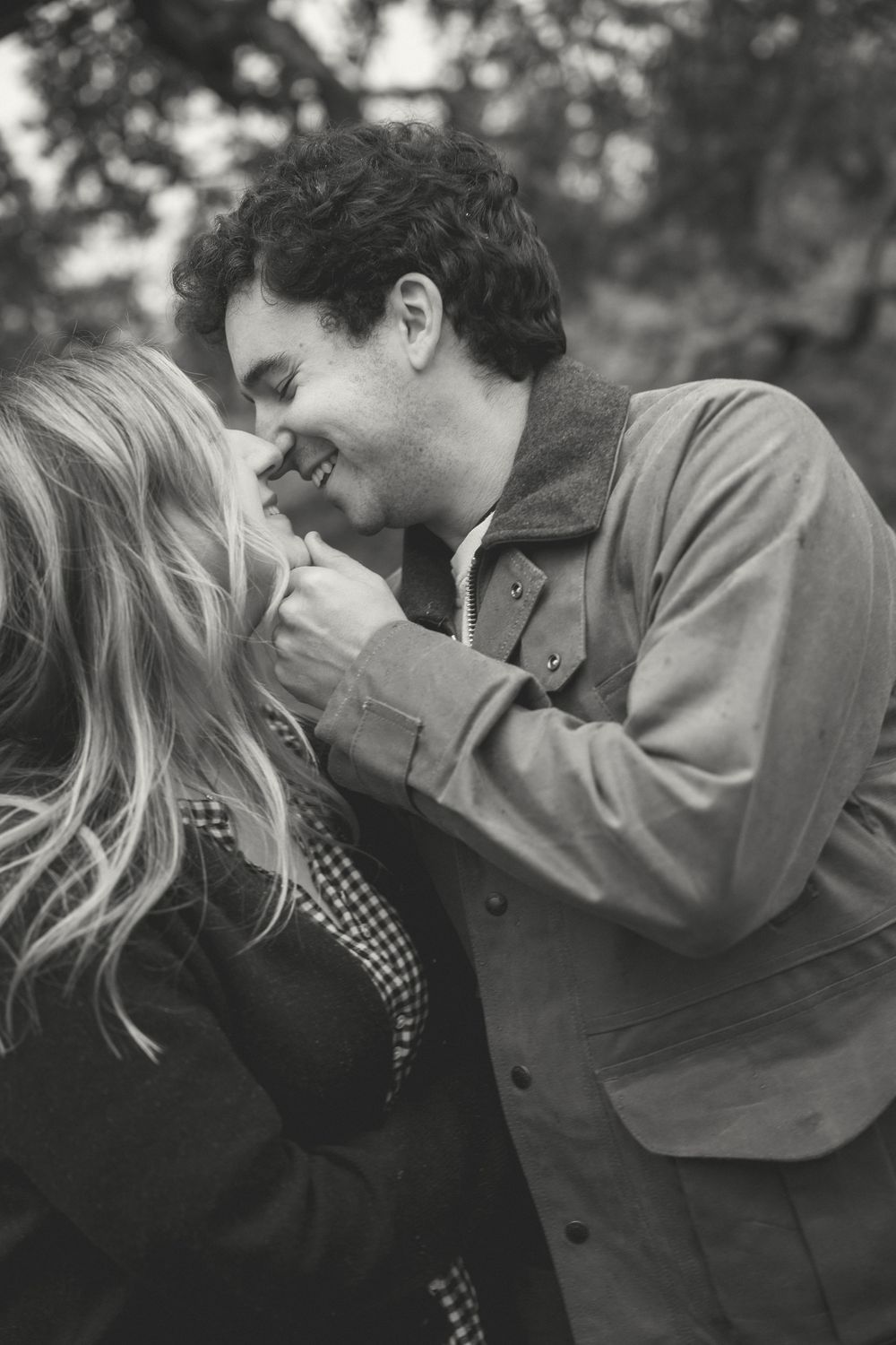 A romantic black and white photo sequence showing a couple sharing an intimate moment together.