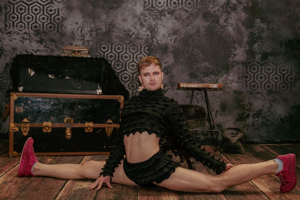 Expressive editorial-style pose in Forgotten Works Studio’s vintage set, Portland creative portrait photography