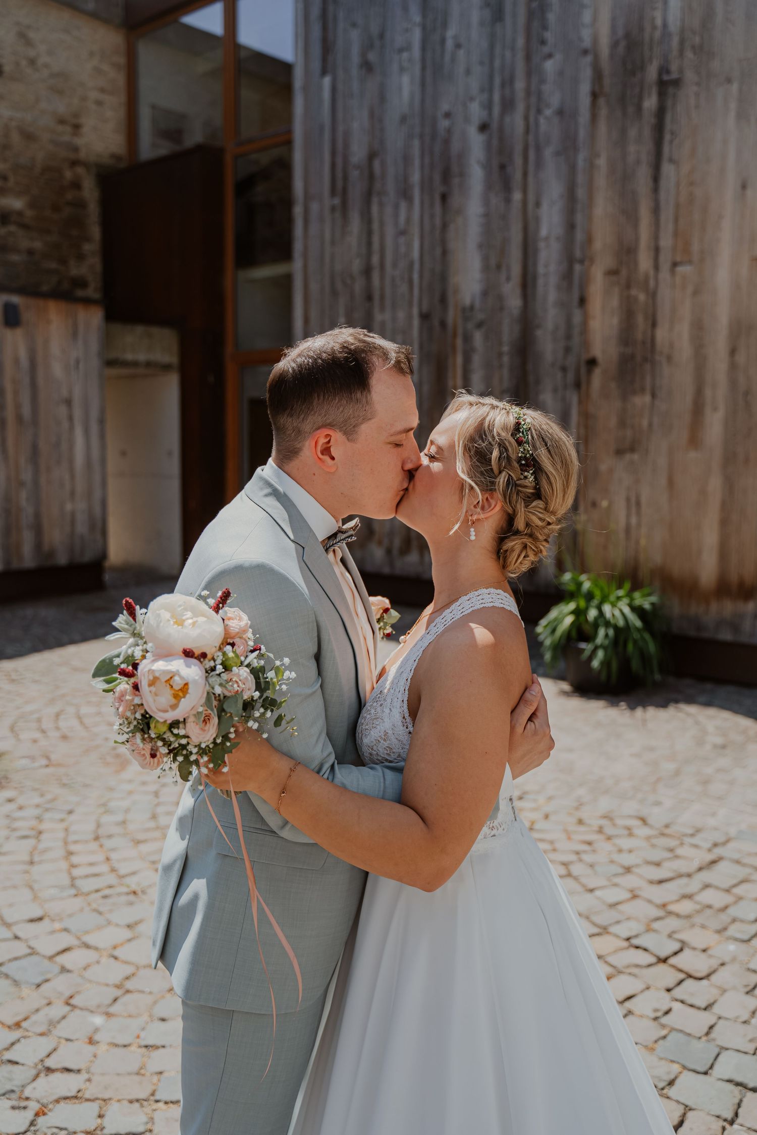 A romantic couple shares intimate moments in a series of tender close-up shots wearing cream colored sweaters.