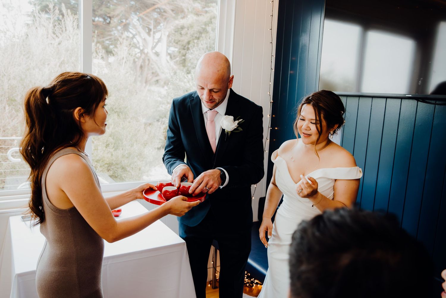 A sequence of candid wedding moments shows couples exchanging rings during an intimate indoor ceremony.