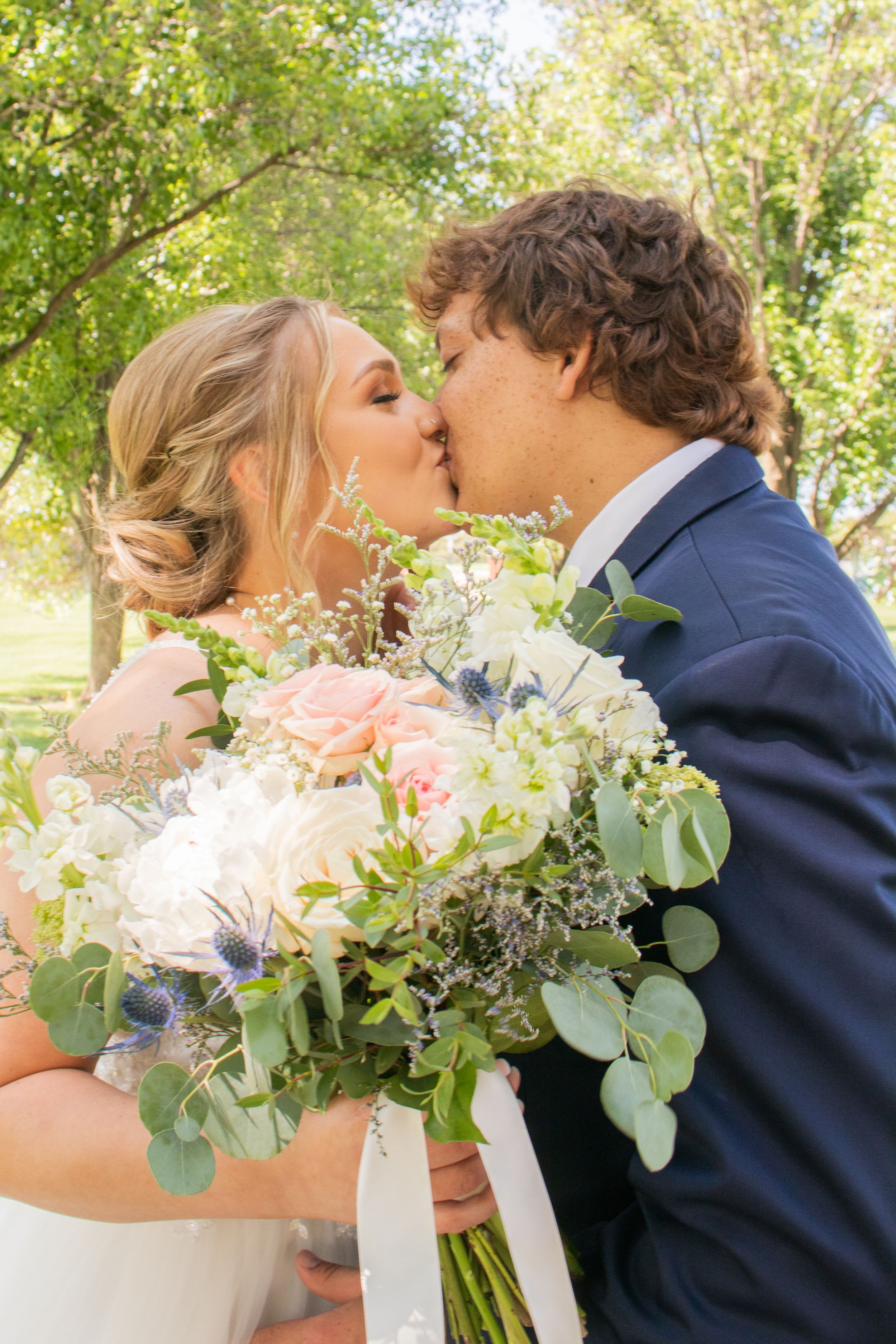 wedding bride and groom kiss