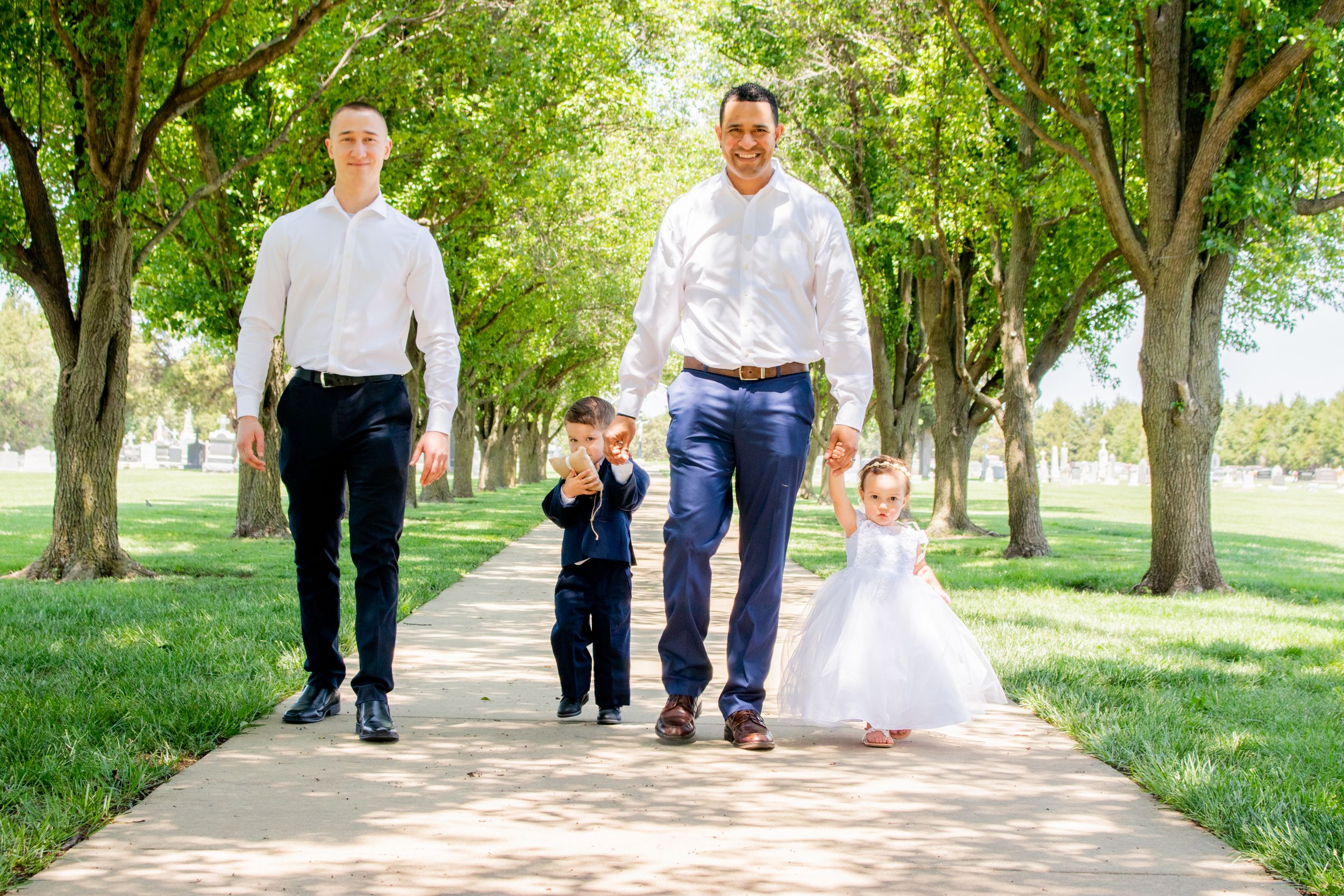 ring bearer and flower girl with escorts to the wedding