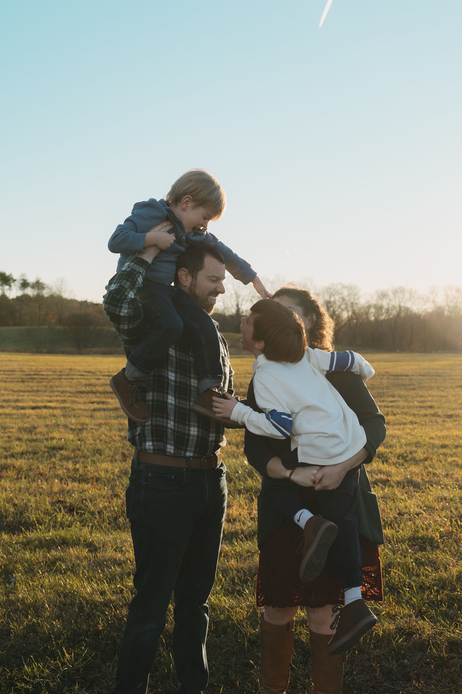 Family photography capturing joyful, natural moments together in Boston & North Shore, MA