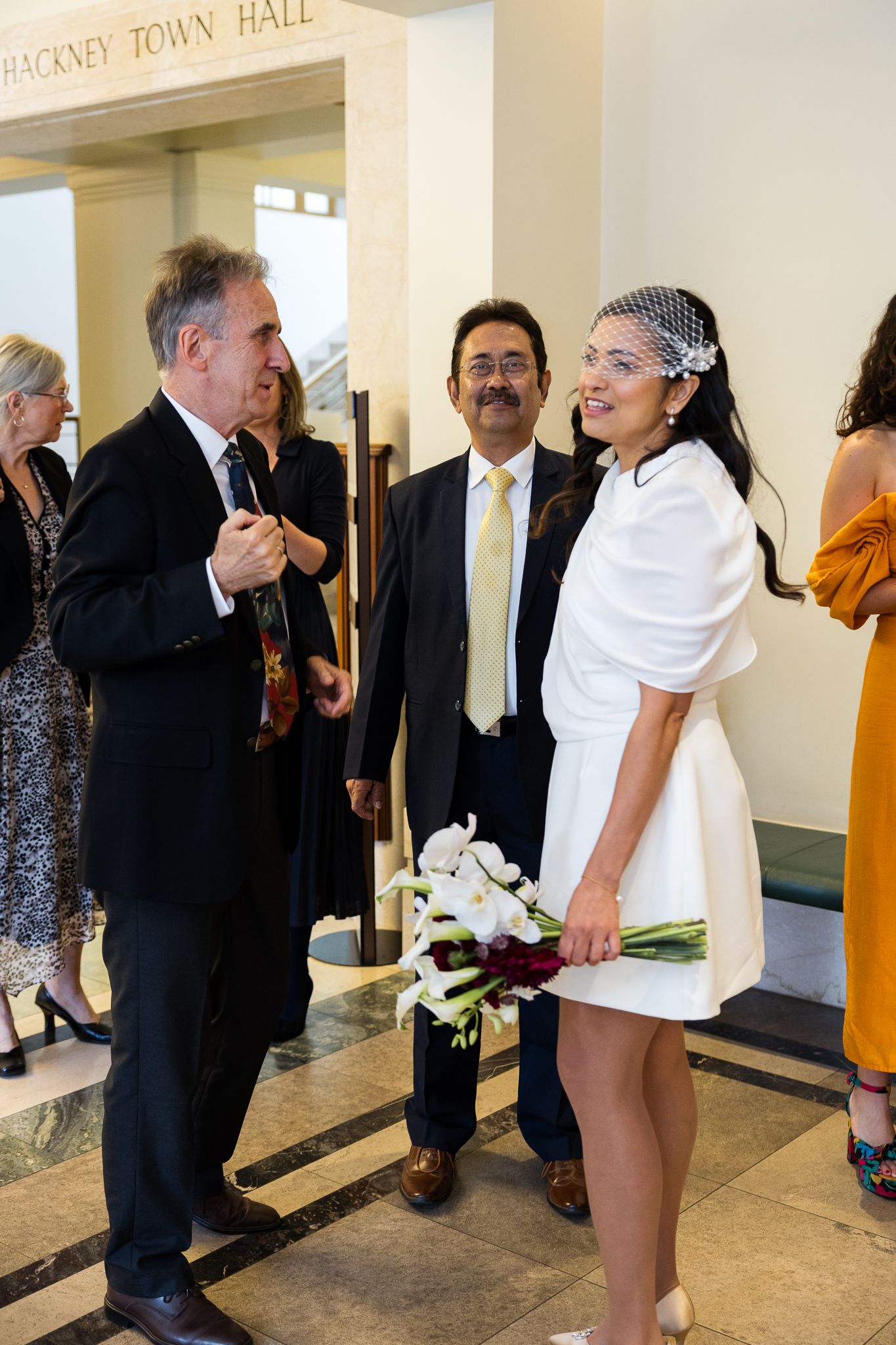 bride with guests at hackney town hall