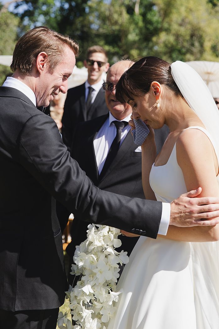 Emotional moment when bride arrives at ceremony.
