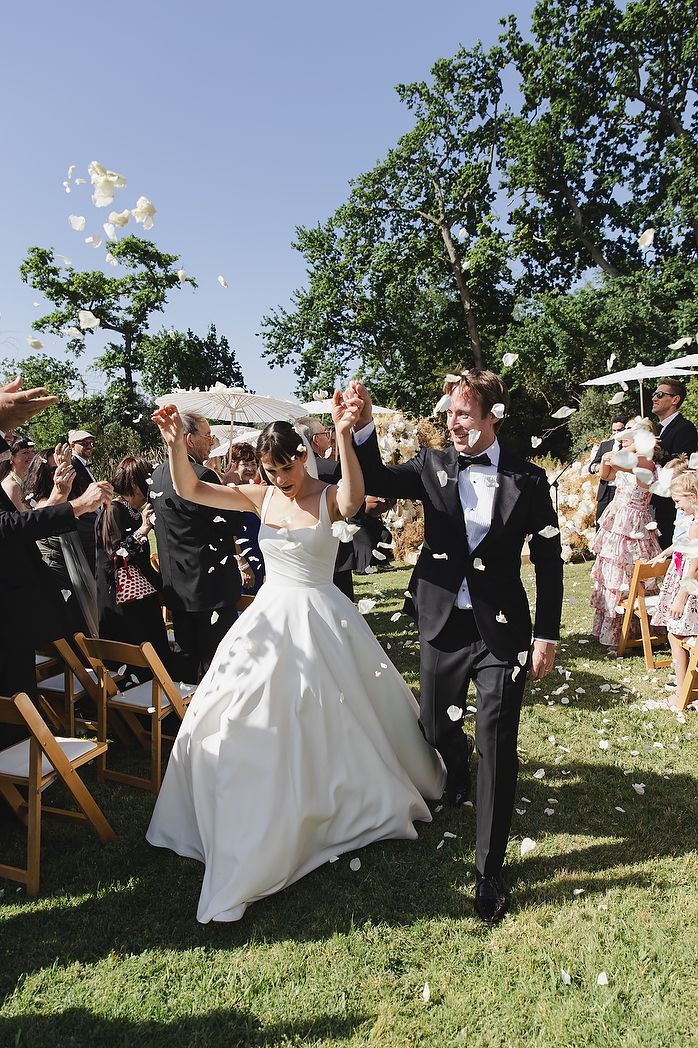 Confetti moment with guests celebrating the couple.