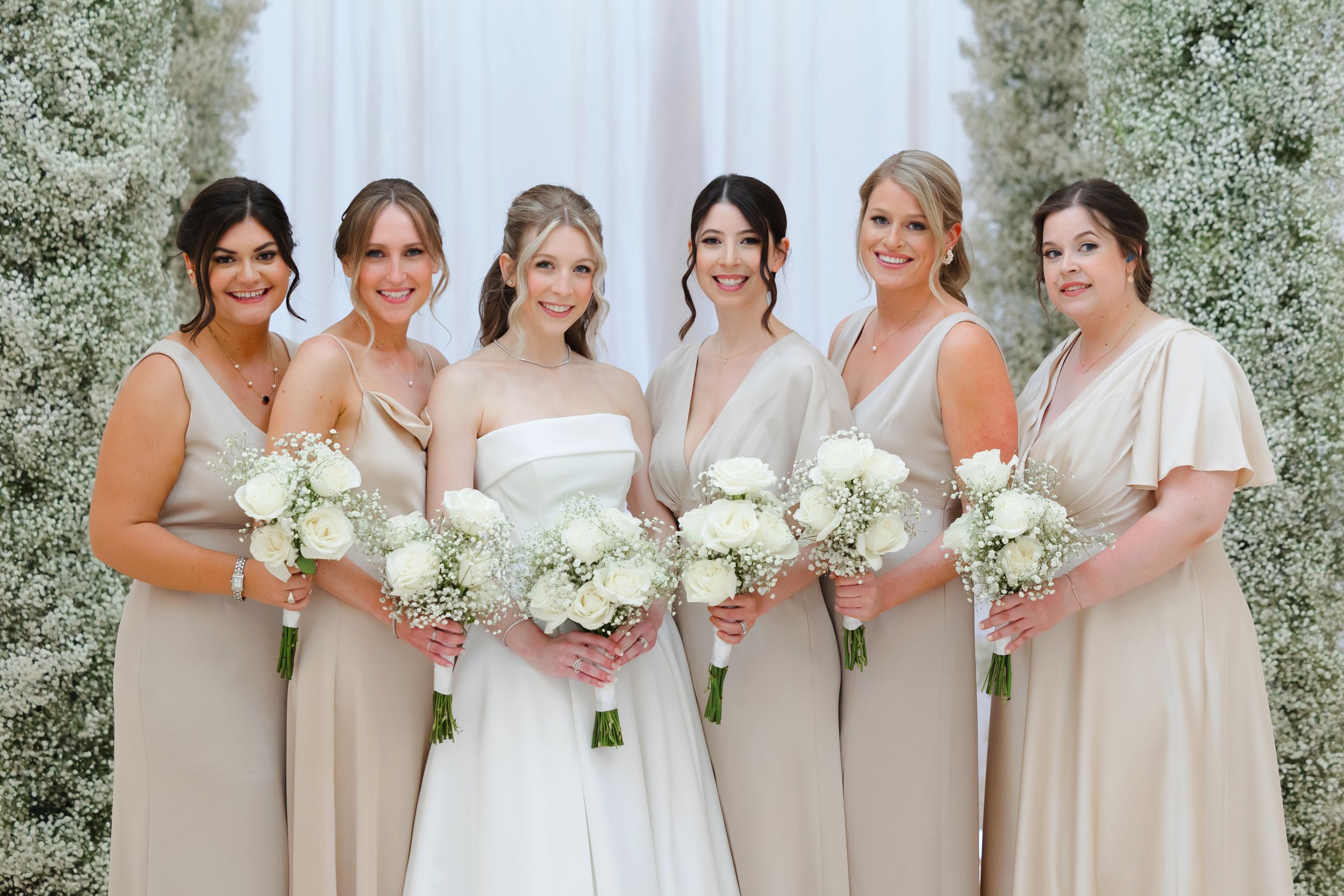 Bride with bridesmaids at BallenIsles Country Club in Palm Beach, Florida during a wedding photographed by Tom Forrest of Ohio.