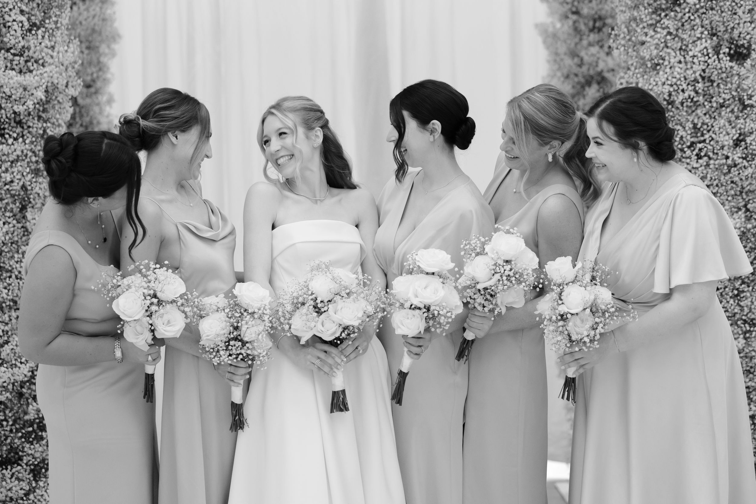 Bride with bridesmaids at BallenIsles Country Club in Palm Beach, Florida during a wedding photographed by Tom Forrest of Ohio.