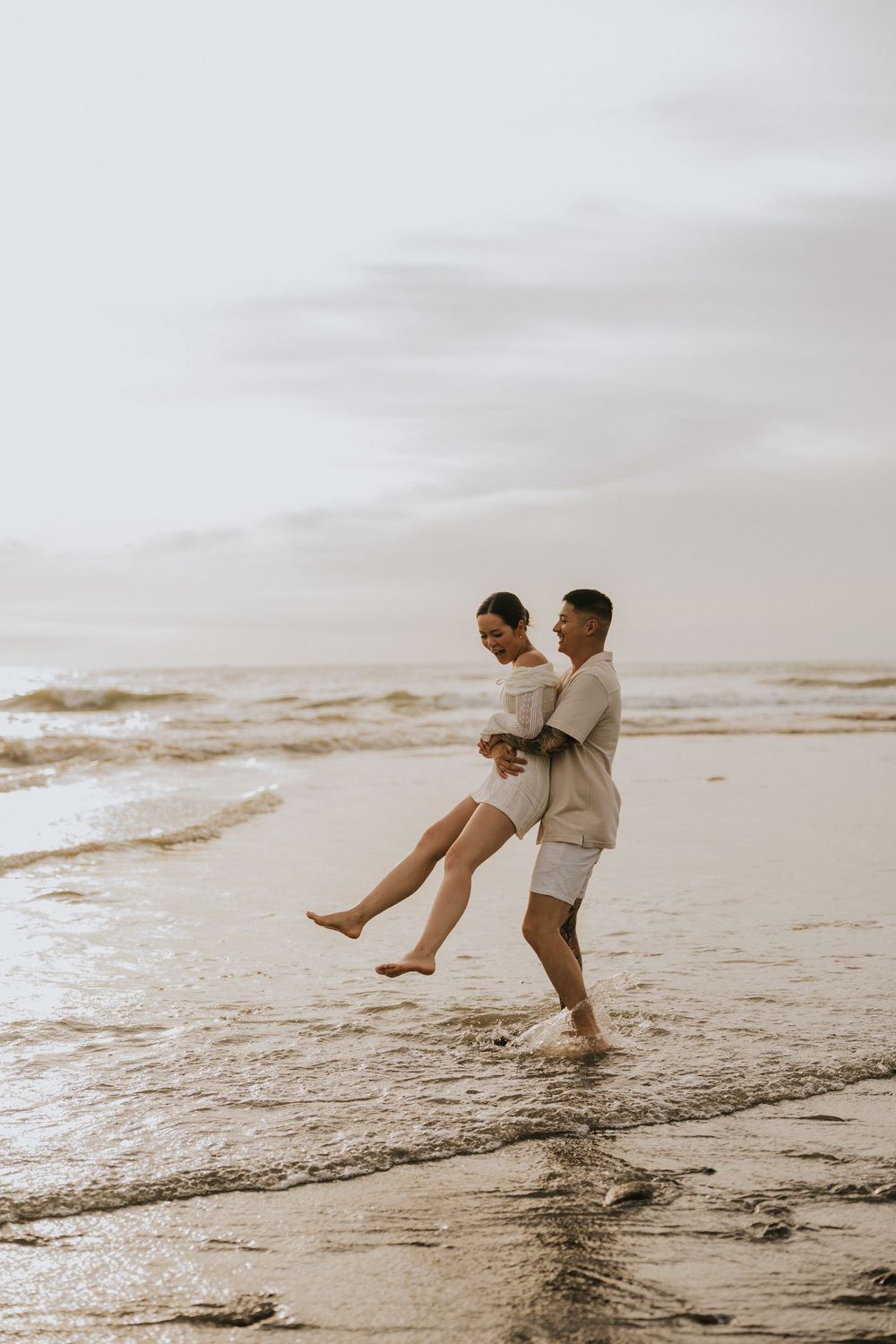 Professional couple portrait session at a peaceful Bali beach.