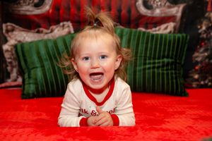 A series of six similar photos arranged horizontally showing holiday-themed portraits against red and green backgrounds.