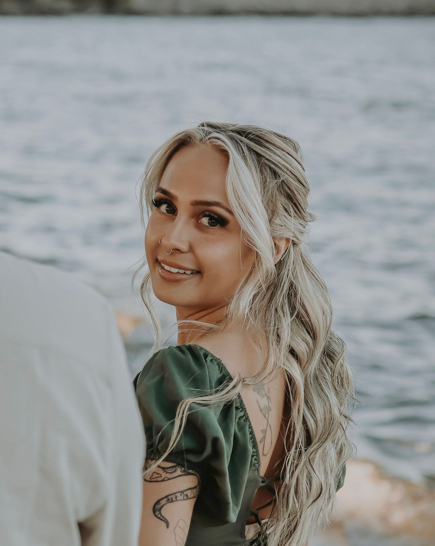 Soft natural light portrait of a woman near the water during a lifestyle, photography session in Michigan